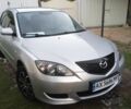 Серый Мазда 3, объемом двигателя 1.4 л и пробегом 250 тыс. км за 3800 $, фото 1 на Automoto.ua