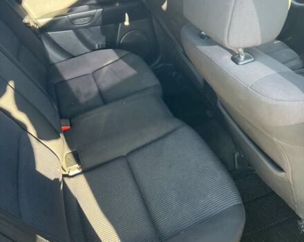 Серый Мазда 3, объемом двигателя 1.56 л и пробегом 170 тыс. км за 2450 $, фото 9 на Automoto.ua