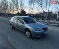 Серый Мазда 3, объемом двигателя 1.6 л и пробегом 244 тыс. км за 4299 $, фото 1 на Automoto.ua