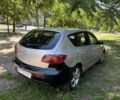 Серый Мазда 3, объемом двигателя 2 л и пробегом 337 тыс. км за 1800 $, фото 2 на Automoto.ua