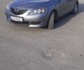 Серый Мазда 3, объемом двигателя 1.3 л и пробегом 197 тыс. км за 3650 $, фото 1 на Automoto.ua