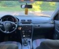 Серый Мазда 3, объемом двигателя 1.6 л и пробегом 130 тыс. км за 4200 $, фото 3 на Automoto.ua