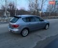 Серый Мазда 3, объемом двигателя 1.6 л и пробегом 244 тыс. км за 4299 $, фото 1 на Automoto.ua