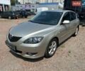 Серый Мазда 3, объемом двигателя 1.6 л и пробегом 172 тыс. км за 3899 $, фото 1 на Automoto.ua