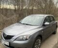 Серый Мазда 3, объемом двигателя 1.6 л и пробегом 297 тыс. км за 1986 $, фото 1 на Automoto.ua