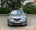 Серый Мазда 3, объемом двигателя 1.6 л и пробегом 255 тыс. км за 3550 $, фото 1 на Automoto.ua