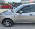 Серый Мазда 3, объемом двигателя 2 л и пробегом 235 тыс. км за 3400 $, фото 1 на Automoto.ua