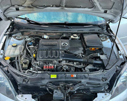 Серый Мазда 3, объемом двигателя 1.6 л и пробегом 229 тыс. км за 4000 $, фото 10 на Automoto.ua