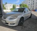 Серый Мазда 3, объемом двигателя 1.6 л и пробегом 289 тыс. км за 3019 $, фото 1 на Automoto.ua