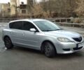 Сірий Мазда 3, об'ємом двигуна 1.4 л та пробігом 234 тис. км за 3999 $, фото 1 на Automoto.ua