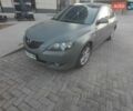 Серый Мазда 3, объемом двигателя 1.6 л и пробегом 288 тыс. км за 3000 $, фото 1 на Automoto.ua
