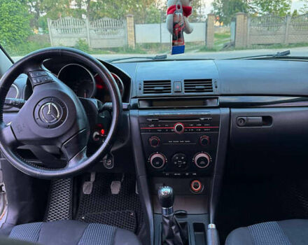 Серый Мазда 3, объемом двигателя 1.6 л и пробегом 229 тыс. км за 4000 $, фото 11 на Automoto.ua