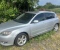 Сірий Мазда 3, об'ємом двигуна 2 л та пробігом 250 тис. км за 1000 $, фото 1 на Automoto.ua