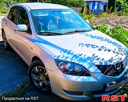 Серый Мазда 3, объемом двигателя 2 л и пробегом 255 тыс. км за 3500 $, фото 2 на Automoto.ua