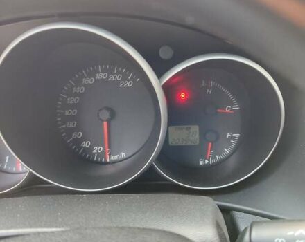 Сірий Мазда 3, об'ємом двигуна 2 л та пробігом 203 тис. км за 4200 $, фото 3 на Automoto.ua