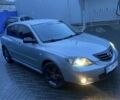 Серый Мазда 3, объемом двигателя 1.6 л и пробегом 240 тыс. км за 3499 $, фото 1 на Automoto.ua