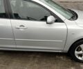 Сірий Мазда 3, об'ємом двигуна 1.6 л та пробігом 188 тис. км за 4450 $, фото 3 на Automoto.ua