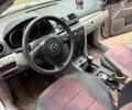 Серый Мазда 3, объемом двигателя 1.35 л и пробегом 250 тыс. км за 2200 $, фото 4 на Automoto.ua