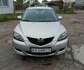 Серый Мазда 3, объемом двигателя 1.6 л и пробегом 244 тыс. км за 4350 $, фото 1 на Automoto.ua