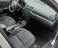 Серый Мазда 3, объемом двигателя 1.6 л и пробегом 320 тыс. км за 3000 $, фото 9 на Automoto.ua