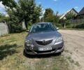 Серый Мазда 3, объемом двигателя 2 л и пробегом 312 тыс. км за 3000 $, фото 1 на Automoto.ua