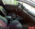 Серый Мазда 3, объемом двигателя 2 л и пробегом 280 тыс. км за 1500 $, фото 2 на Automoto.ua