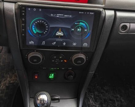 Сірий Мазда 3, об'ємом двигуна 2 л та пробігом 145 тис. км за 3999 $, фото 2 на Automoto.ua