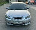 Серый Мазда 3, объемом двигателя 1.6 л и пробегом 289 тыс. км за 3900 $, фото 1 на Automoto.ua