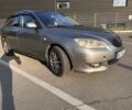Серый Мазда 3, объемом двигателя 2 л и пробегом 240 тыс. км за 3518 $, фото 1 на Automoto.ua