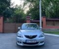 Серый Мазда 3, объемом двигателя 1.6 л и пробегом 130 тыс. км за 4200 $, фото 1 на Automoto.ua