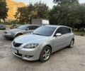 Серый Мазда 3, объемом двигателя 1.6 л и пробегом 241 тыс. км за 2800 $, фото 1 на Automoto.ua