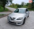 Серый Мазда 3, объемом двигателя 1.6 л и пробегом 320 тыс. км за 3000 $, фото 1 на Automoto.ua