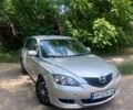 Серый Мазда 3, объемом двигателя 1.56 л и пробегом 294 тыс. км за 3100 $, фото 1 на Automoto.ua