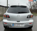 Сірий Мазда 3, об'ємом двигуна 1.4 л та пробігом 284 тис. км за 4150 $, фото 5 на Automoto.ua
