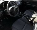 Серый Мазда 3, объемом двигателя 1.3 л и пробегом 235 тыс. км за 3400 $, фото 7 на Automoto.ua