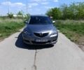 Серый Мазда 3, объемом двигателя 1.6 л и пробегом 196 тыс. км за 5000 $, фото 1 на Automoto.ua
