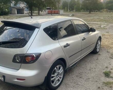 Серый Мазда 3, объемом двигателя 1.3 л и пробегом 221 тыс. км за 4999 $, фото 2 на Automoto.ua