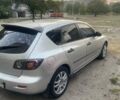 Серый Мазда 3, объемом двигателя 1.4 л и пробегом 221 тыс. км за 4999 $, фото 2 на Automoto.ua
