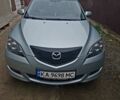 Серый Мазда 3, объемом двигателя 1.6 л и пробегом 206 тыс. км за 3950 $, фото 1 на Automoto.ua