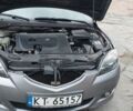 Серый Мазда 3, объемом двигателя 1.6 л и пробегом 270 тыс. км за 1999 $, фото 2 на Automoto.ua