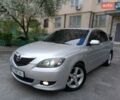 Серый Мазда 3, объемом двигателя 1.6 л и пробегом 350 тыс. км за 4200 $, фото 1 на Automoto.ua