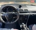 Сірий Мазда 3, об'ємом двигуна 1.56 л та пробігом 342 тис. км за 4200 $, фото 1 на Automoto.ua
