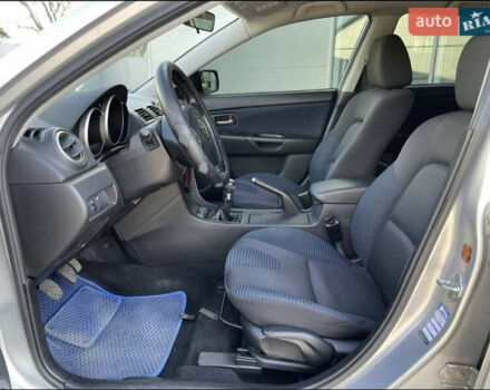 Серый Мазда 3, объемом двигателя 2 л и пробегом 191 тыс. км за 4100 $, фото 3 на Automoto.ua