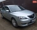 Серый Мазда 3, объемом двигателя 1.6 л и пробегом 206 тыс. км за 3950 $, фото 1 на Automoto.ua