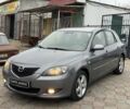 Серый Мазда 3, объемом двигателя 1.6 л и пробегом 243 тыс. км за 3950 $, фото 1 на Automoto.ua