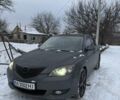 Серый Мазда 3, объемом двигателя 1.6 л и пробегом 294 тыс. км за 3700 $, фото 1 на Automoto.ua
