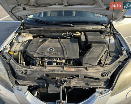 Серый Мазда 3, объемом двигателя 2 л и пробегом 191 тыс. км за 4700 $, фото 12 на Automoto.ua