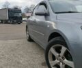 Сірий Мазда 3, об'ємом двигуна 1.6 л та пробігом 295 тис. км за 3198 $, фото 1 на Automoto.ua
