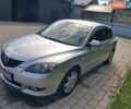 Сірий Мазда 3, об'ємом двигуна 2 л та пробігом 181 тис. км за 4150 $, фото 1 на Automoto.ua