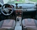 Сірий Мазда 3, об'ємом двигуна 1.6 л та пробігом 187 тис. км за 3950 $, фото 11 на Automoto.ua
